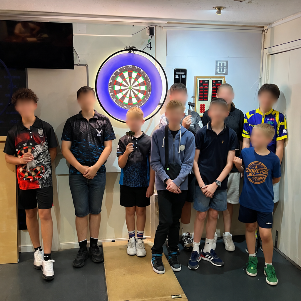Young players taking part in a Points Darts Academy session